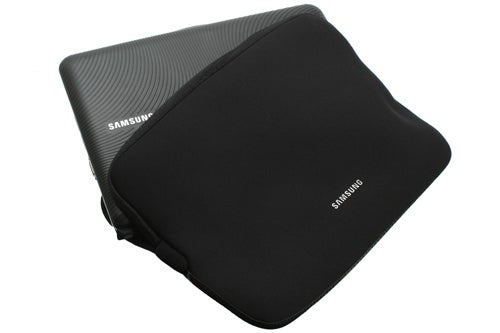 Samsung NB30 laptop with protective sleeve.
