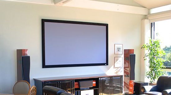 Screen Innovations Black Diamond screen installed in a living room.
