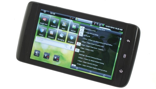 Dell Streak smartphone displaying home screen icons.
