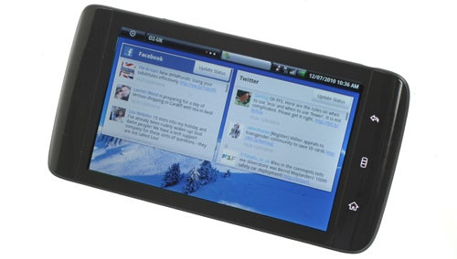 Dell Streak displaying Facebook and Twitter on screen.