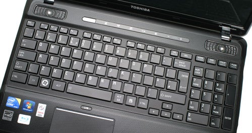 Toshiba Satellite A660-14C laptop keyboard and touchpad close-up.