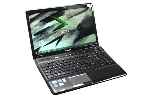 Toshiba Satellite A660-14C laptop open on table.