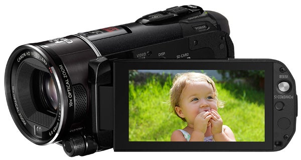 Canon Legria HF S21 camcorder with flip-out LCD screen displaying a child.