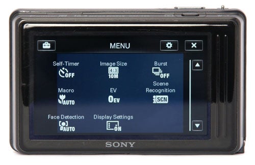 Sony Cyber-shot DSC-TX5 camera displaying menu on LCD screen.