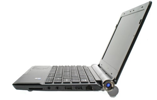MSI Wind U160 netbook with external webcam attached.