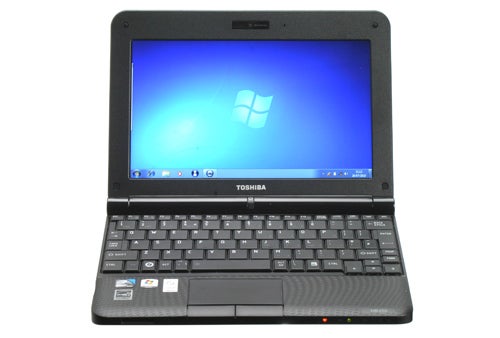 Toshiba NB250 netbook with Windows desktop screen.
