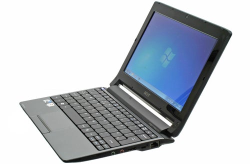 Acer Aspire One 533 netbook with Windows displayed on screen.