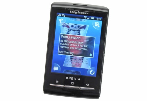 Sony Ericsson X10 mini smartphone displaying Twitter feed.
