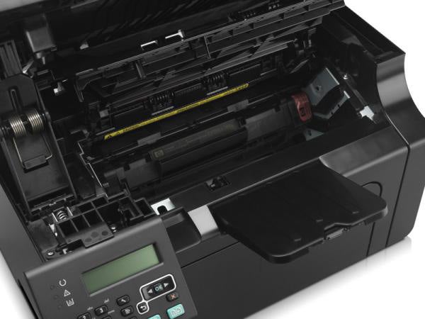 Close-up of HP LaserJet Pro M1212nf printer's open toner compartment.