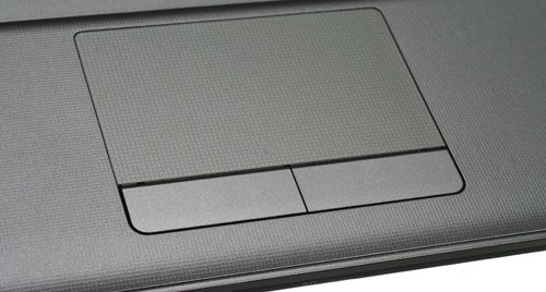 Close-up of Sony VAIO laptop's trackpad and buttons.