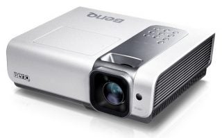 BenQ W1000+ projector on a white background