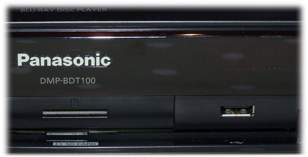 Close-up of Panasonic DMP-BDT100 Blu-ray disc player front view.