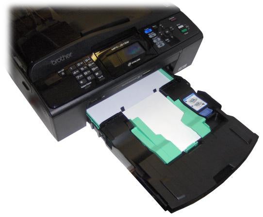 Brother MFC-J615W multifunction printer with open tray.