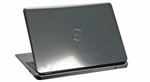 Dell Inspiron M301z laptop closed on white background.