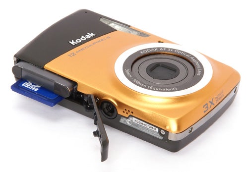 Kodak EasyShare M530 camera with open memory card slot.