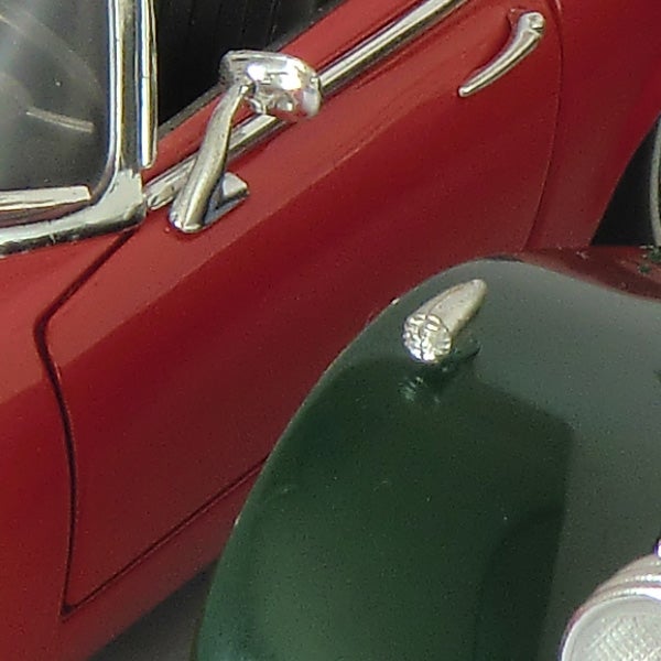Close-up of a model car showcasing detailed textures.