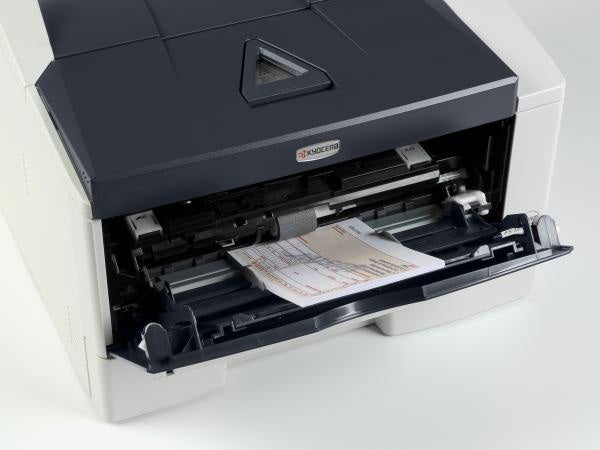 Kyocera Mita FS-1370DN printer with open tray and printed graph.