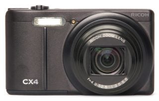 Ricoh CX4 compact digital camera on white background.