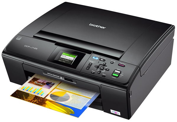 Brother DCP-J125 inkjet printer with printed documents.