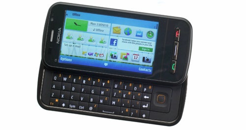 Nokia C6 smartphone with slide-out QWERTY keyboard.