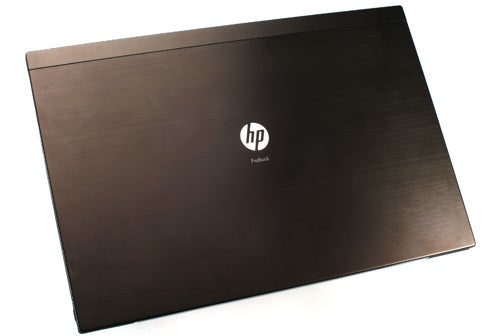 HP ProBook 5320m laptop with closed lid on desk.