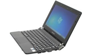 Samsung N230 netbook open with Windows desktop visible.