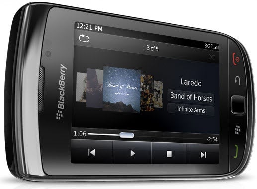 BlackBerry Torch 9800 smartphone displaying music player.