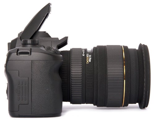 Sigma SD15 DSLR camera with lens on white background.
