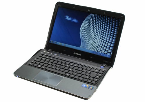 Samsung SF310 laptop open showing screen and keyboard.