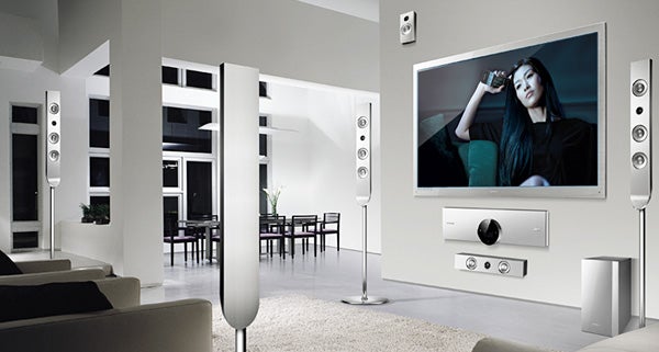 Samsung HT-C9950W home theater system setup in modern living room.