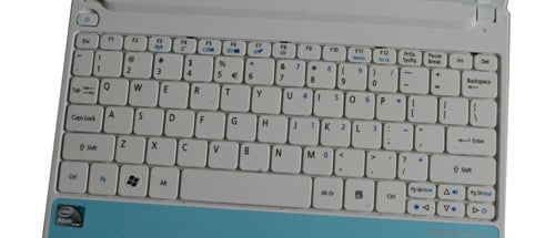 Acer Aspire D255 laptop keyboard and partial view of screen.