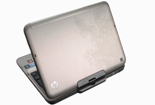 HP TouchSmart tm2-1010ea laptop with patterned lid design.