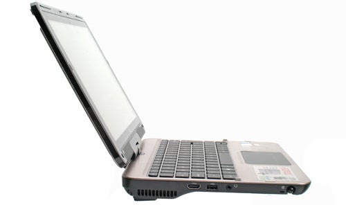 HP TouchSmart tm2-1010ea laptop with screen tilted back.