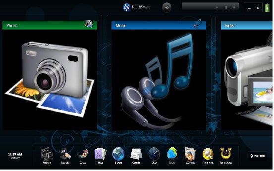 HP TouchSmart tm2 interface showcasing multimedia applications.