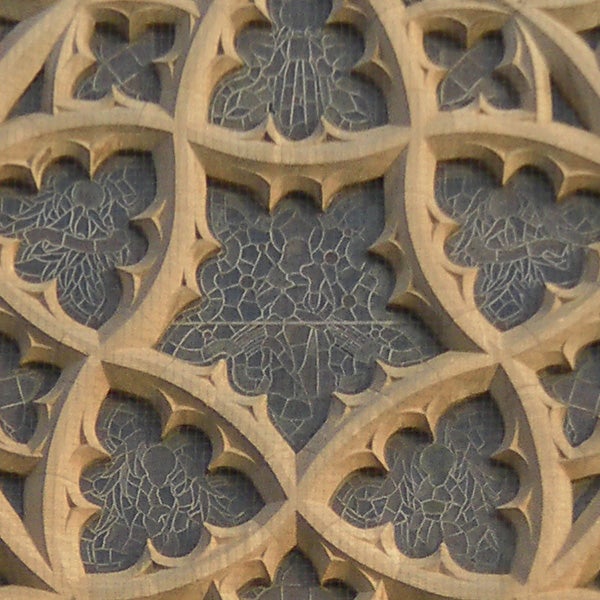 Intricate wooden lattice pattern detail.