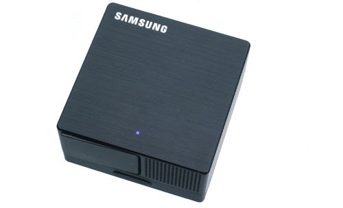 Samsung H03 portable projector on white background.