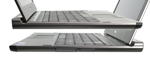 Dell Latitude 13 laptops with open lids from a side view
