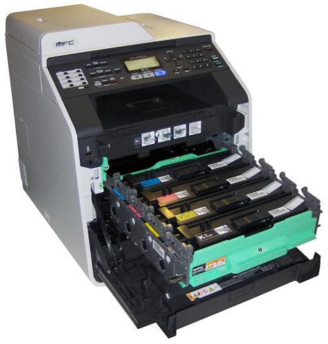 Brother MFC-9465CDN printer with open toner compartment.