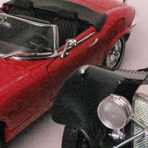 Photo sample from Sigma DP1x showing vintage red car and motorcycle.