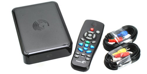 Seagate FreeAgent GoFlex TV media player with remote and cables.