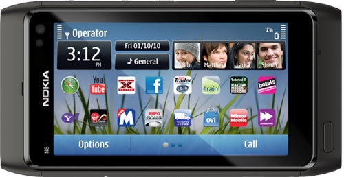 Nokia N8 smartphone displaying colorful home screen with apps.