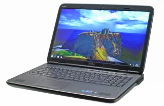 Dell XPS 17 L701X laptop with screen displaying wallpaper