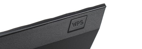 Close-up of Asus RT-N56U router showing WPS button.