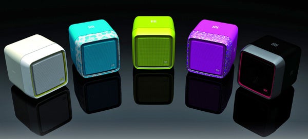 Five colorful Q2 Internet Radios displayed in a row on a reflective surface.