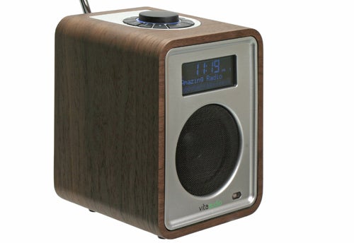Vita Audio R1 MkII radio with digital display on wooden background.