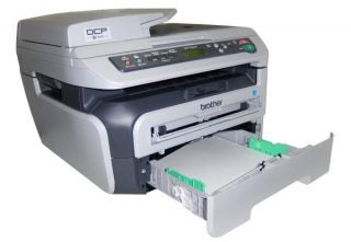 Brother DCP-7045N multifunction printer with paper tray open.
