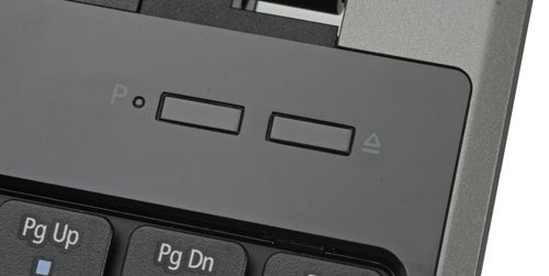 Close-up of Acer Aspire 5745DG laptop power button area.