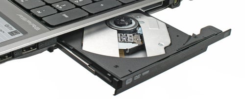 Acer Aspire 5745DG laptop with open DVD drive.