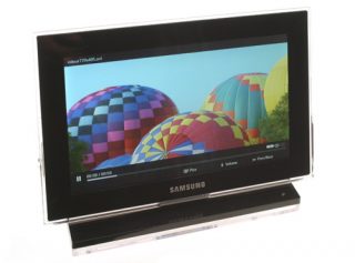 Samsung 1000P digital photo frame displaying colorful hot air balloons.
