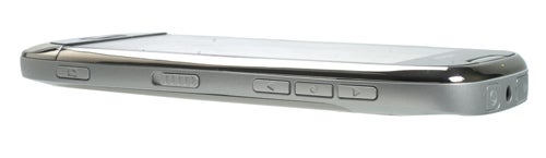 Side view of Nokia C7 smartphone showing buttons and ports.